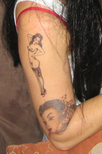 http://tattoostars.files.wordpress.com/2009/01/tattoo_amy-winehouse_tattoos_36.jpg