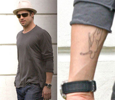 male celebrity tattoos. Brad Pitt Tattoos