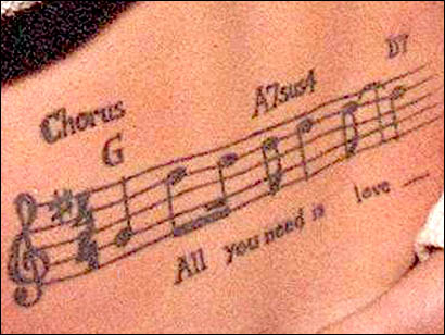 treble clef tattoo 