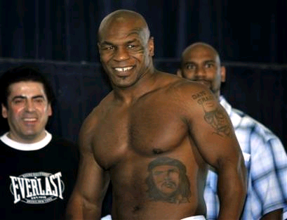  and Iron Mike as examples of excessive tattooing 